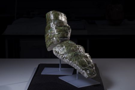 A recently reconstructed brass Roman arm guard, now green and discolored, &quot;gleamed gold&quot; 2,000 years ago.