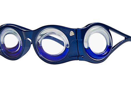 The Boarding Glasses have two round lenses in front and two on the side, the hollow rims each half filled with blue liquid.