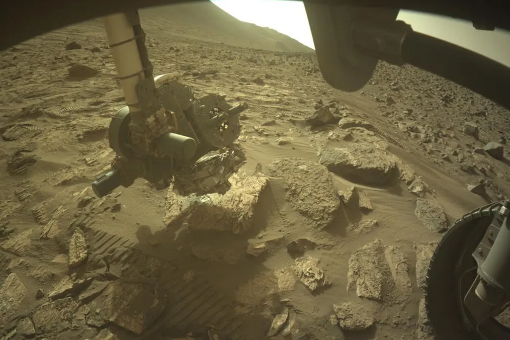 a robotic arm operating on the surface of Mars