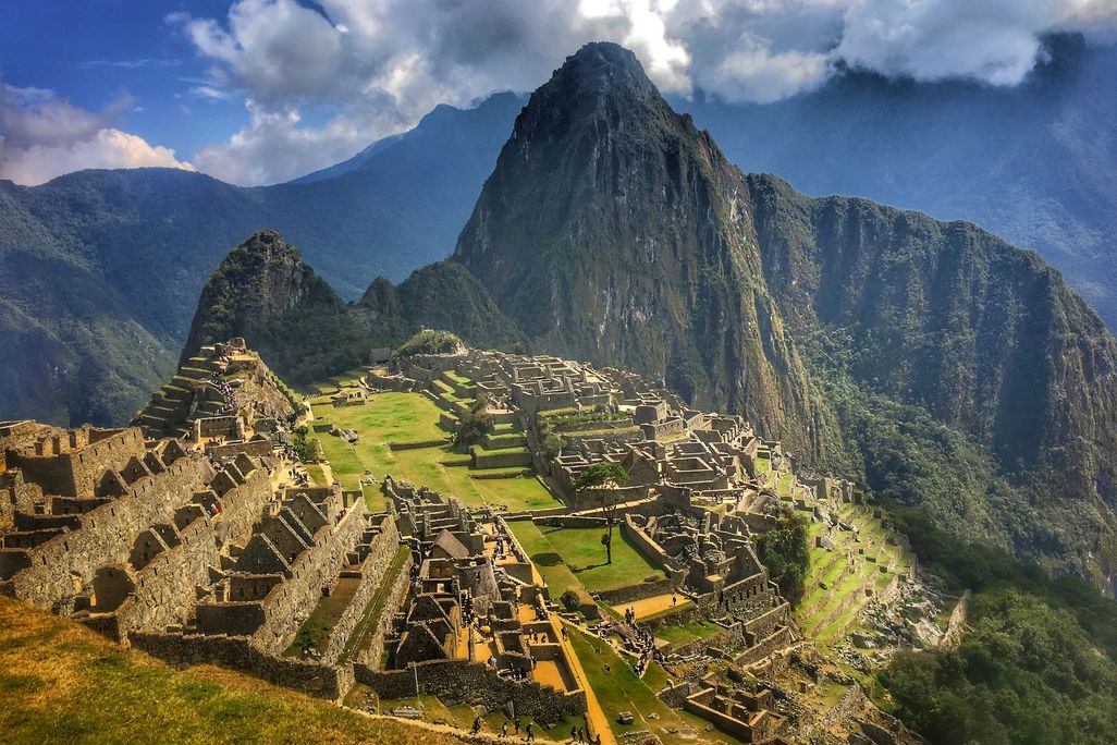 Panoramic View Of Machu Picchu Against Cloudy Sky