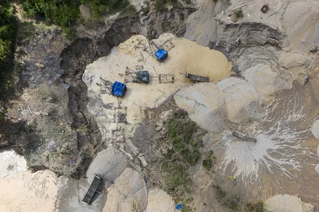 An aerial view of&nbsp;dredges at an illegal gold mining area in the Amazon region of Peru.