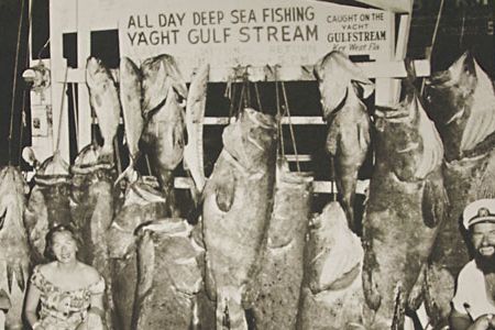 1957: A half century ago, tourists in Key West routinely caught goliath grouper (the big fish with the big mouths) and large sharks (on the dock).