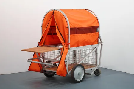 Homeless Vehicle, Variant 5 by Krzysztof Wodiczko, c. 1988, aluminum, fabric, wire cage and hardware