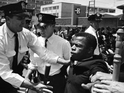 John Lewis has been arrested at least 45 times—and three previously buried records have now been unearthed