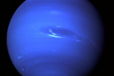 Neptune, captured by the Voyager 2 spacecraft. A new study finds a link between the planet&#39;s cloud coverage and solar activity.