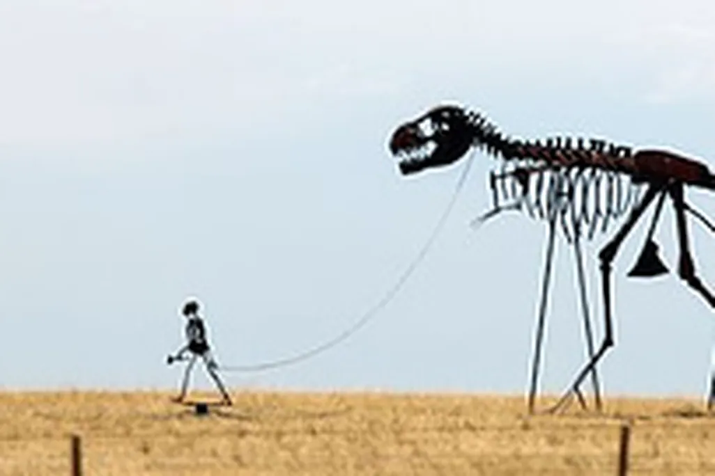 20110520083126caveman-skeleton-walk-dinosaur.jpg