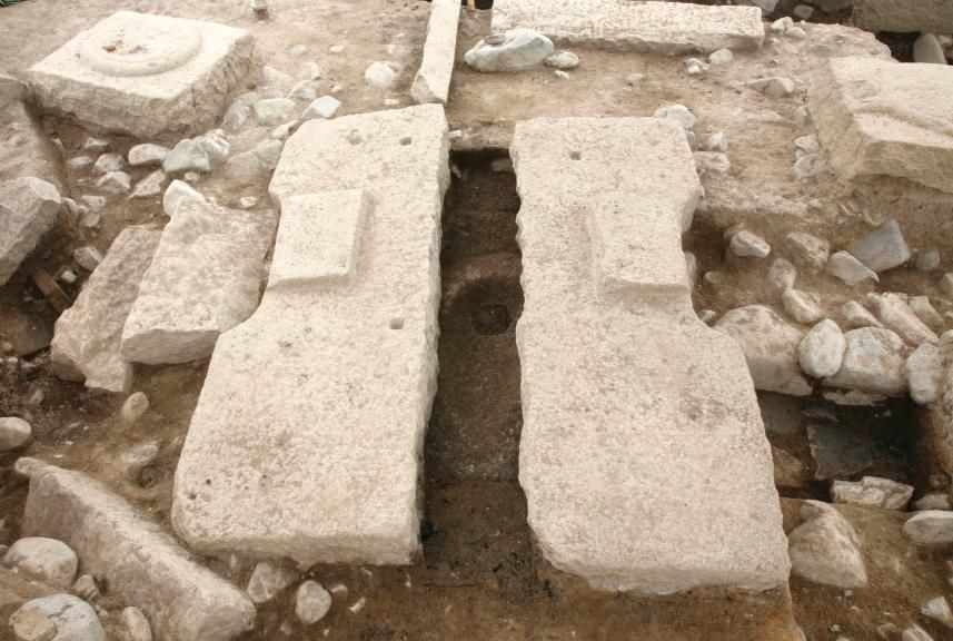 Stone slabs with a hole in the middle