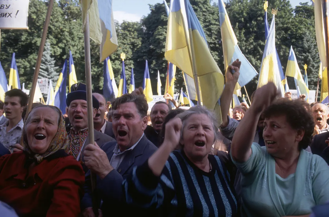 A crowd holds a demonstration outside of the Soviet headquarters in Kyiv in September 1991, after Ukraine declared its independence.