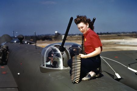 Workers test one of the B-25’s .50 caliber Browning machine guns. Each gun was test-fired with a minimum of 25 rounds.