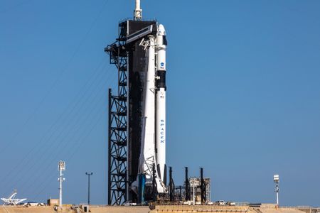 SpaceX Falcon 9 rocket at Launch Complex 39A at Kennedy Space Center in the days before the first crewed launch of the Crew Dragon spacecraft.