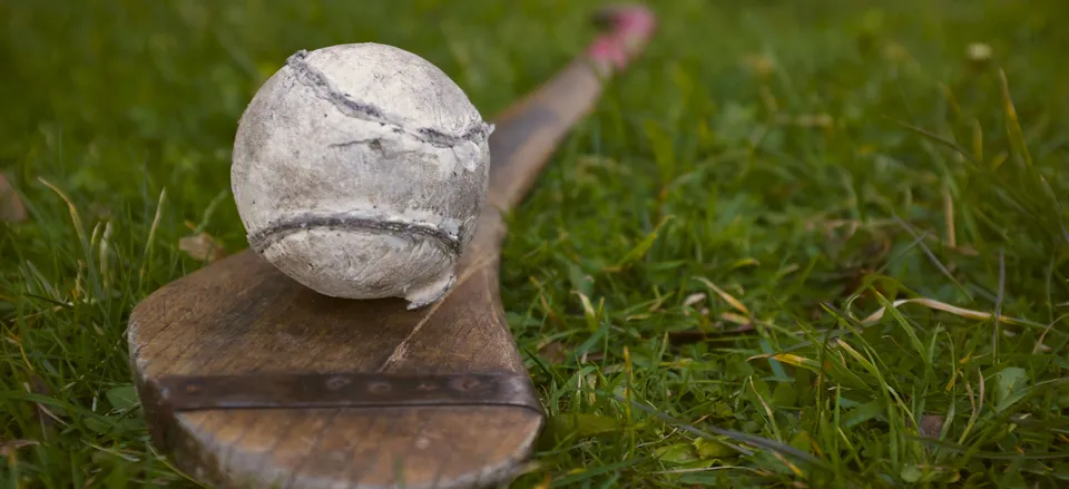  Racket and ball for the traditional game of hurling 