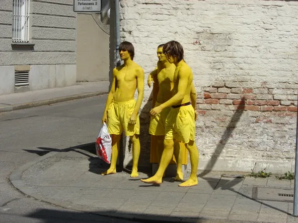 3 guys painted yellow thumbnail