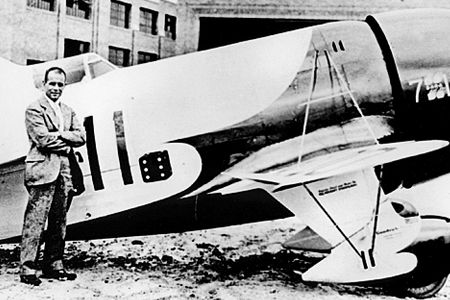 Jimmy Doolittle is dwarfed by the monstrous, menacing Gee Bee R-1 Super Sportster.