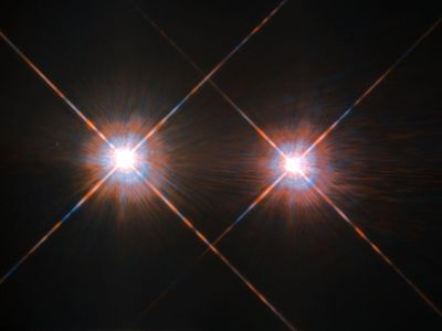Our stellar next-door neighbors, Alpha Centauri A (left) and B, shine brightly in this Hubble Space Telescope image.