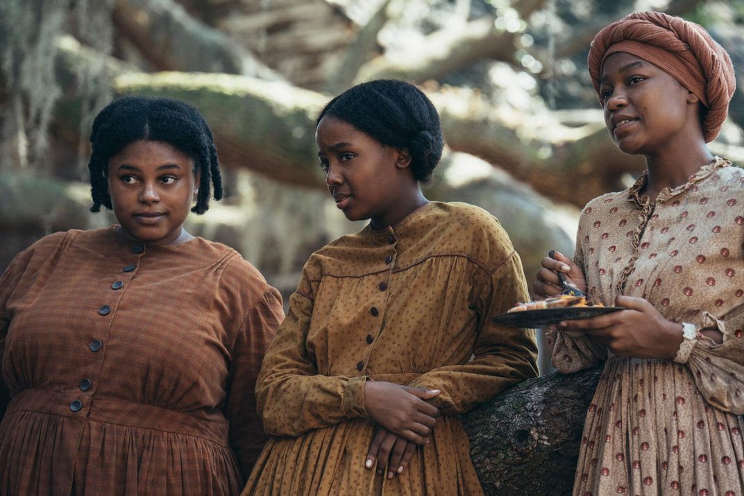 Mbedu stars as Cora (center). Zsane Jhe, left, and Aubriana Davis, right, portray other women enslaved on the Randall plantation.