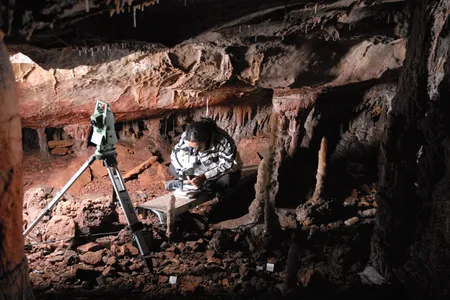 Marián Cueto, author of a new study on fossilized cave lion claws, working in La Garma.