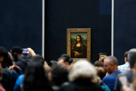 Tourists wait to see Leonardo da Vinci's Mona Lisa.