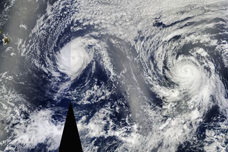 Satellite view of Hurricanes Iselle (left) and Julio (right) approaching Hawaii. From NASA's Aqua satellite