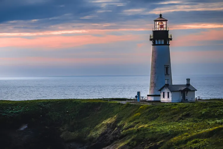 OPENER - Built in 1872, the Yaquina Head Lighthouse sits atop a narrow point of land that extends almost a mile into the Pacific Ocean.