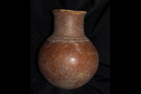 A high-necked polychrome pot, created sometime between&nbsp;1100 and 1400 B.C.E., was among the more than 900 items returned to Mali.