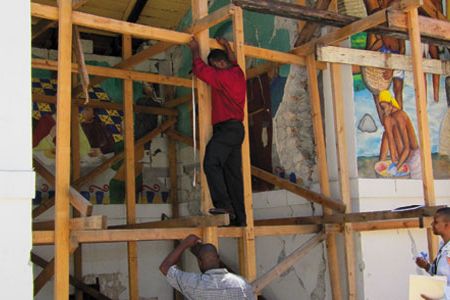 Smithsonian conservators are helping to save the murals at Holy Trinity Cathedral.