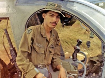 Pilot Clyde Romero, 19, rests between flights at Khe Sanh in February 1971. His unit was flying in support of South Vietnamese troops fighting in Laos.
