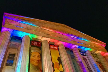SAAM lit for Pride 2018. Photo by Andrew Rondinone. The museum exterior will be lit again for Pride 2019 from May 31 through June 9.