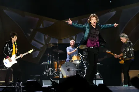 Ronnie Wood (far left) has taken on the role in Rolling Stones originally filled by Brian Jones. 