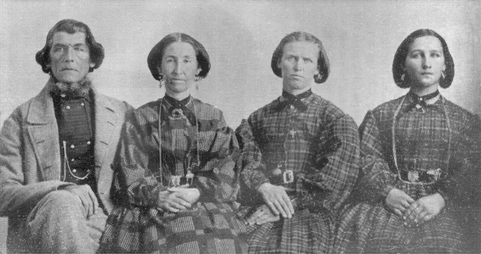Elder Ira Eldredge and his three wives around 1864