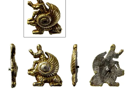 The intricately crafted ornament, which depicts a knight emerging out of a snail shell perched atop of a goat, measures less than an inch long.