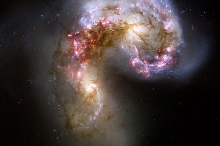Hubble captures two galaxies merging.