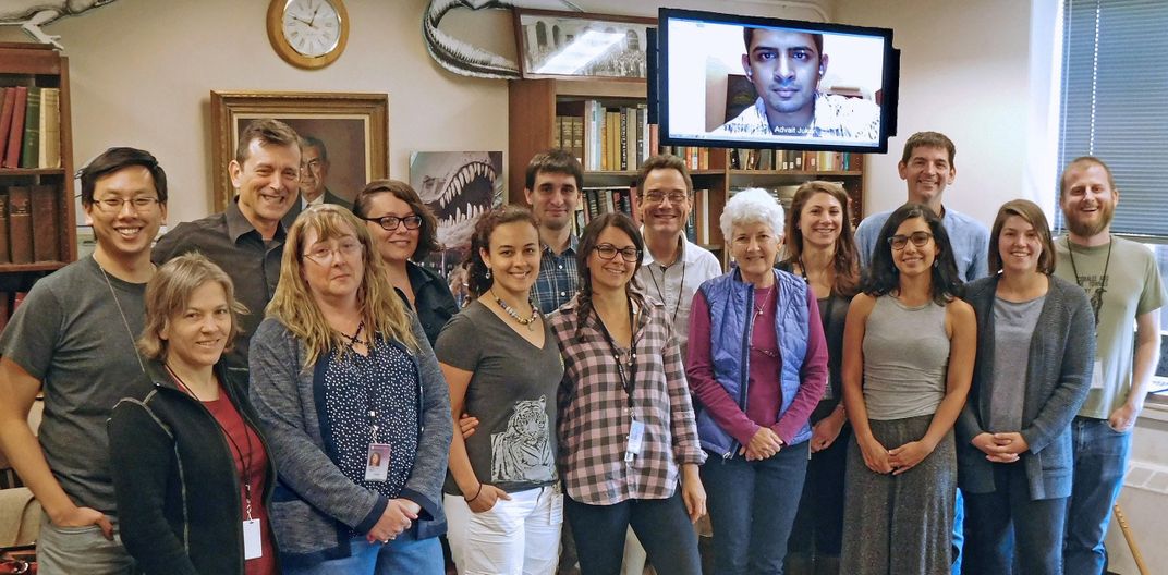 A large group of people posing the photo.