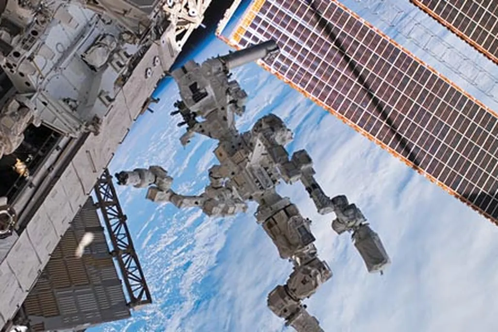 Two-armed Dextre robot, which will be used to demonstrate orbital refueling.