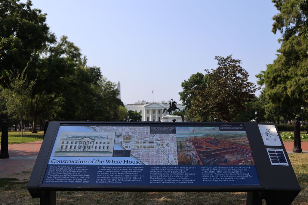 A view of the informational plaque, which features an image of the White House construction plans and the quarries used to obtain materials