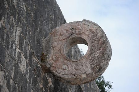 The Maya played games like pok-a-tok, in which players hit a rubber ball through a stone circle such as this one in the ancient city of Chichen Itza.