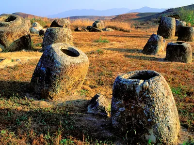 The Plain of Jars in northeast Laos may be related to burial rituals dating back 2,000 years—but the site still proves a mystery to archeologists.