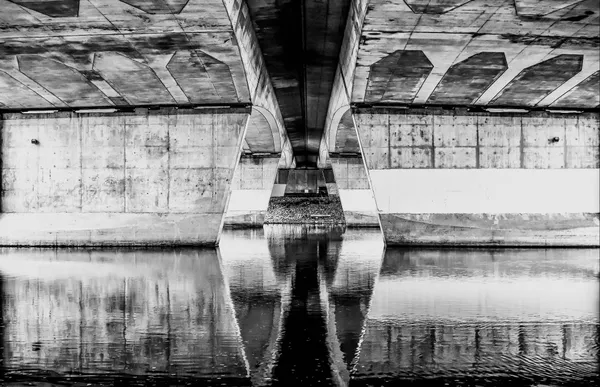 Reflection under a bridge downtown. thumbnail