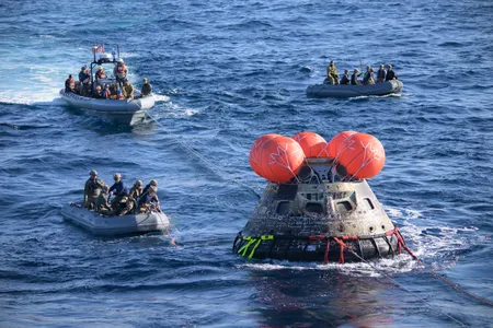 The U.S. Navy works to recover the Orion spacecraft following its 2022 test flight to the moon.