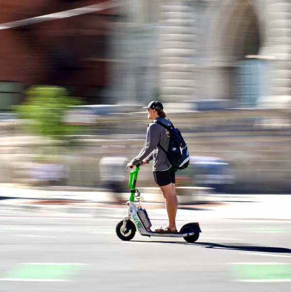 Panning shot of a Scooter Rider thumbnail