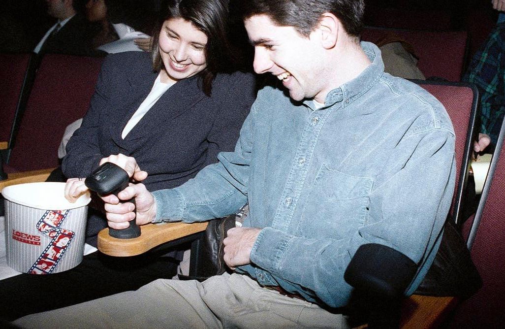 Moviegoers familiarize themselves