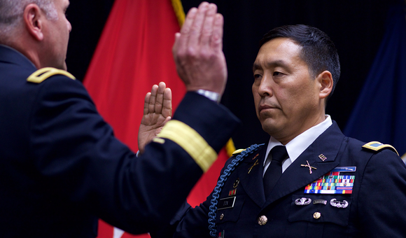 Alaska Army National Guard Col. Wayne Don, then 38th Troop Command commander, pledges the Oath of Office, administered by Alaska Army National Guard Brig. Gen. Joseph Streff, Alaska Army National Guard commander, after Don was promoted to full colonel. Dena'ina Center, Anchorage, July 14, 2017.  (U.S. Army photo by Sgt. David Bedard)
