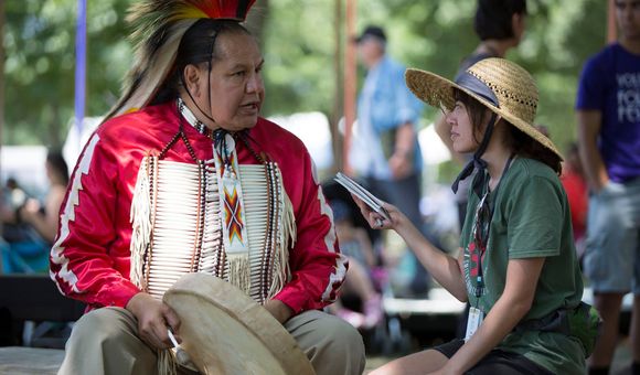 Elisa Hough interviews Dennis Zotigh (Kiowa/San Juan Pueblo/Santee Dakota), a cultural specialist at the National Museum of the American Indian. (Daniel Martinez, Center for Folklife and Cultural Heritage, Ralph Rinzler Folklife Archives.)