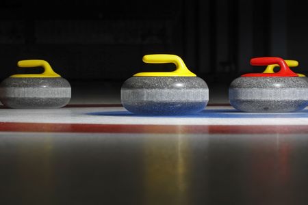 Why does a curling stone curl?