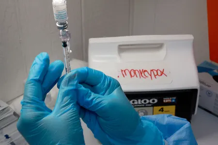 A registered nurse measures out a monkeypox vaccine in Miami, Florida.