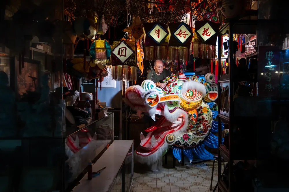 A teacher in Hong Kong is reportedly making a traditional dragon.