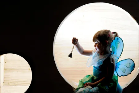 A young girl plays at the newly restored Moat Brae house. 