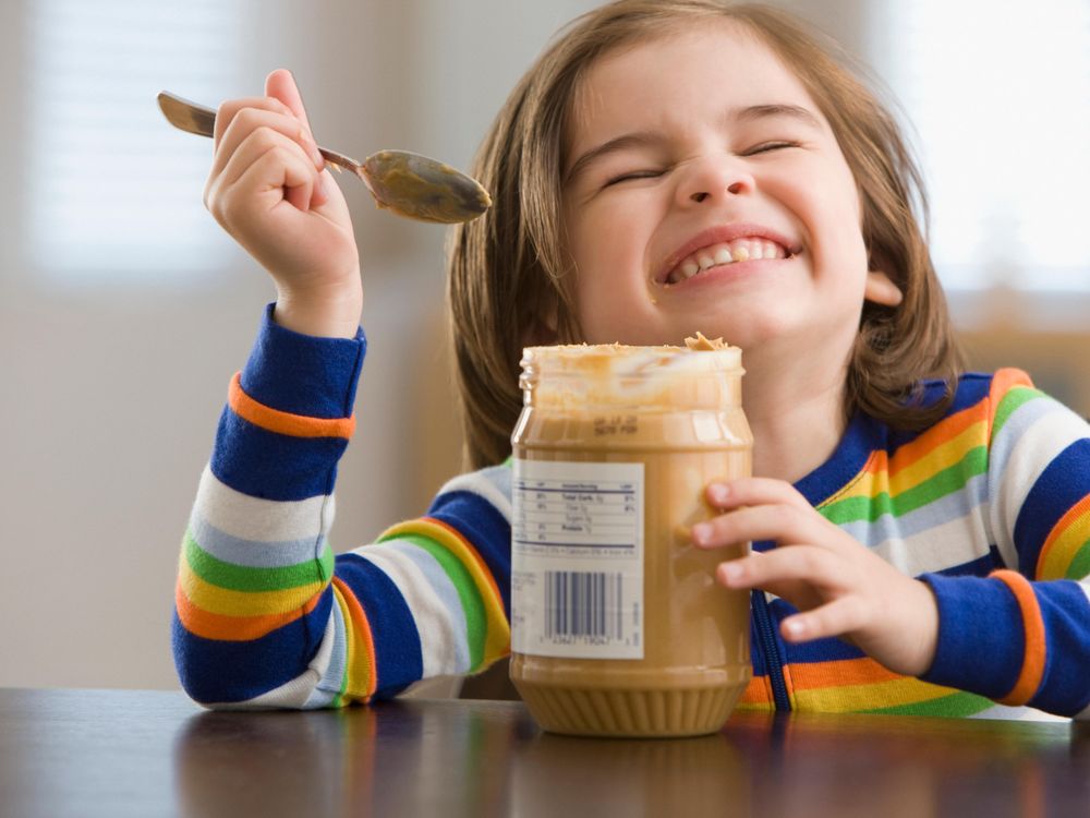 Kid Eating Peanut Butter