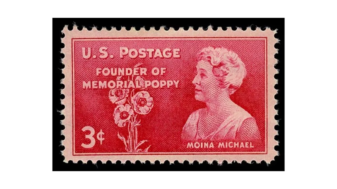 Red postage stamp honoring Moina Michael as the founder of the memorial poppy