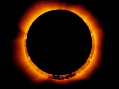 An annular solar eclipse, captured by the solar optical telescope Hinode as the moon passed between it and the sun.