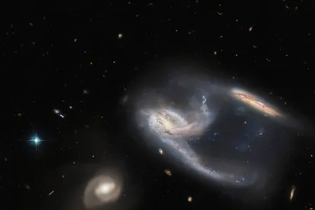 The celestial bodies are known as NGC 7764A and reside in the Phoenix constellation 425 million light-years away from Earth.